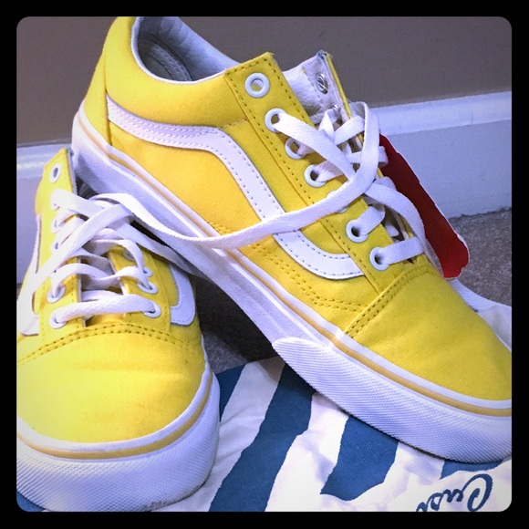 spectra yellow slip on vans